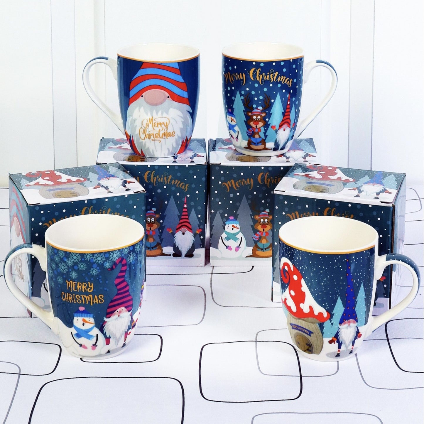 Set of 2 gift boxed Christmas mugs with assorted gnome images.