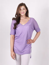 Load image into Gallery viewer, Purple v neck 1/2 sleeve top.  The back of the top is longer than the
