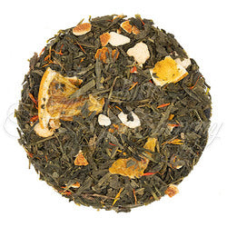 Green Tea Leaves with large pieces of dried oranges and safflower petals.  Arranged in a circle on a white background